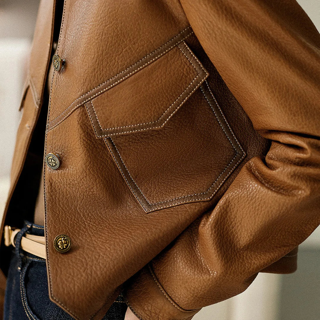 Veste femme à col structuré, poches plaquées et fermeture bouton