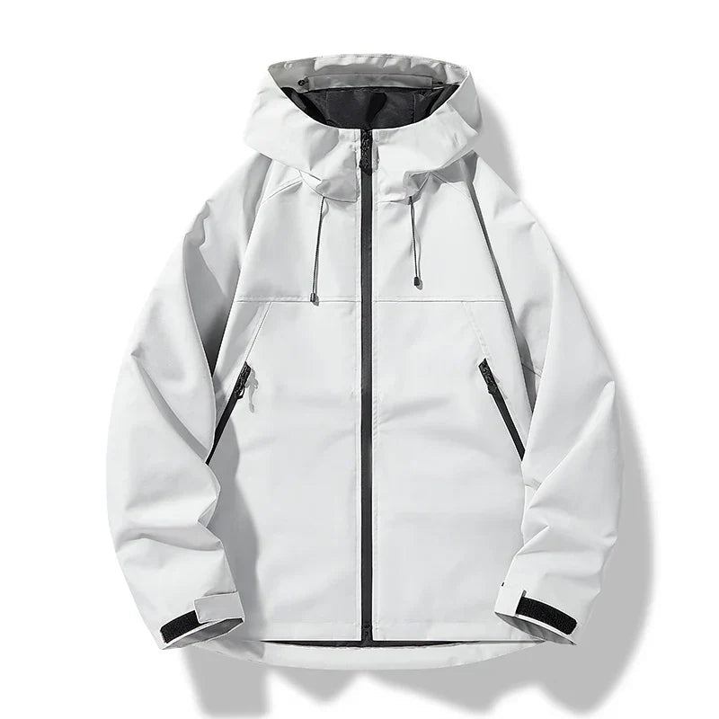 Veste femme coupe droite imperméable à capuche et poches zippées