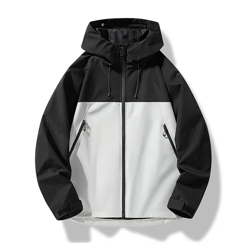 Veste femme coupe droite imperméable à capuche et poches zippées