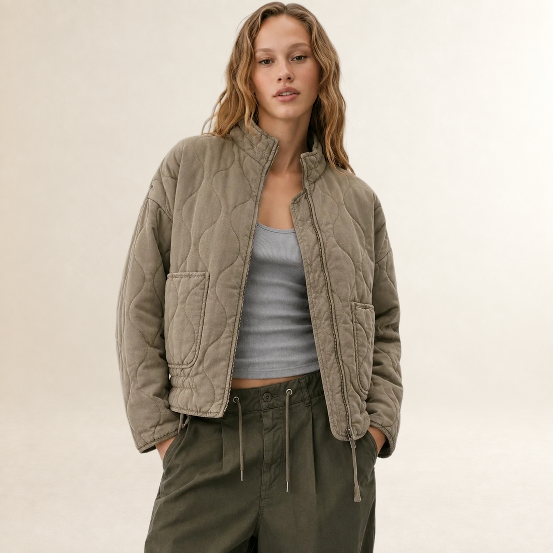 Veste femme quiltée à col haut et poches plaquées - coupe décontractée