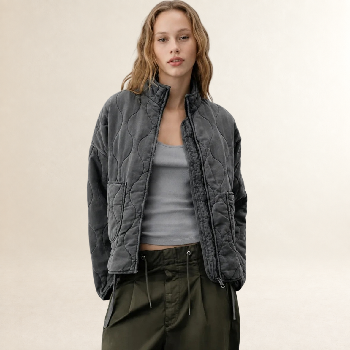 Veste femme quiltée à col haut et poches plaquées - coupe décontractée