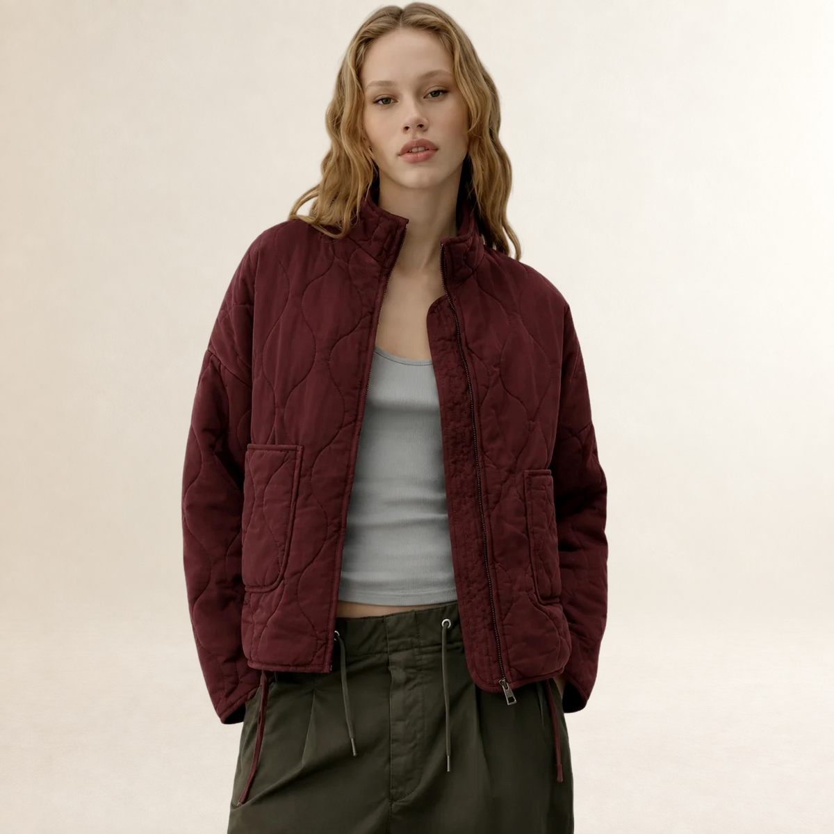 Veste femme quiltée à col haut et poches plaquées - coupe décontractée