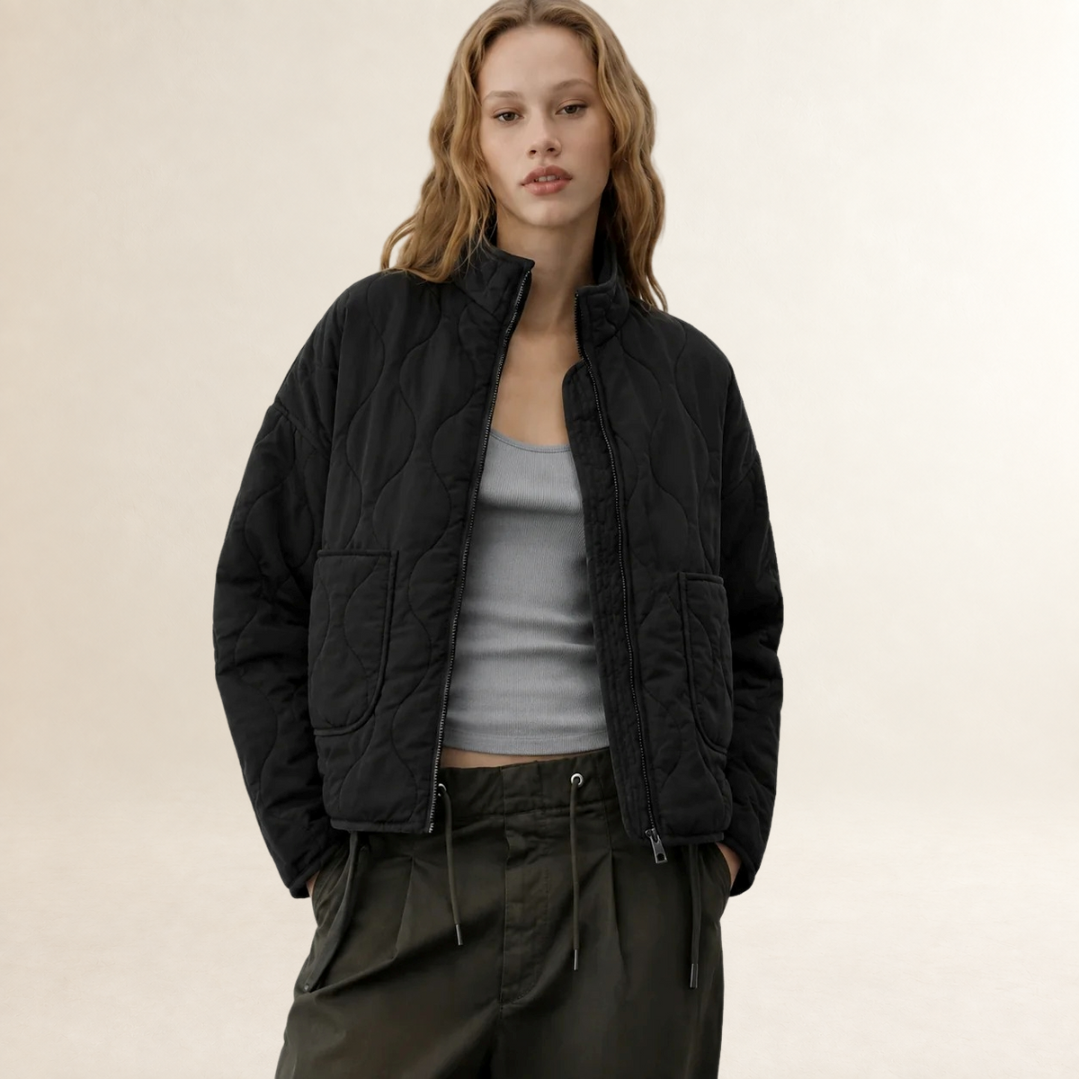 Veste femme quiltée à col haut et poches plaquées - coupe décontractée