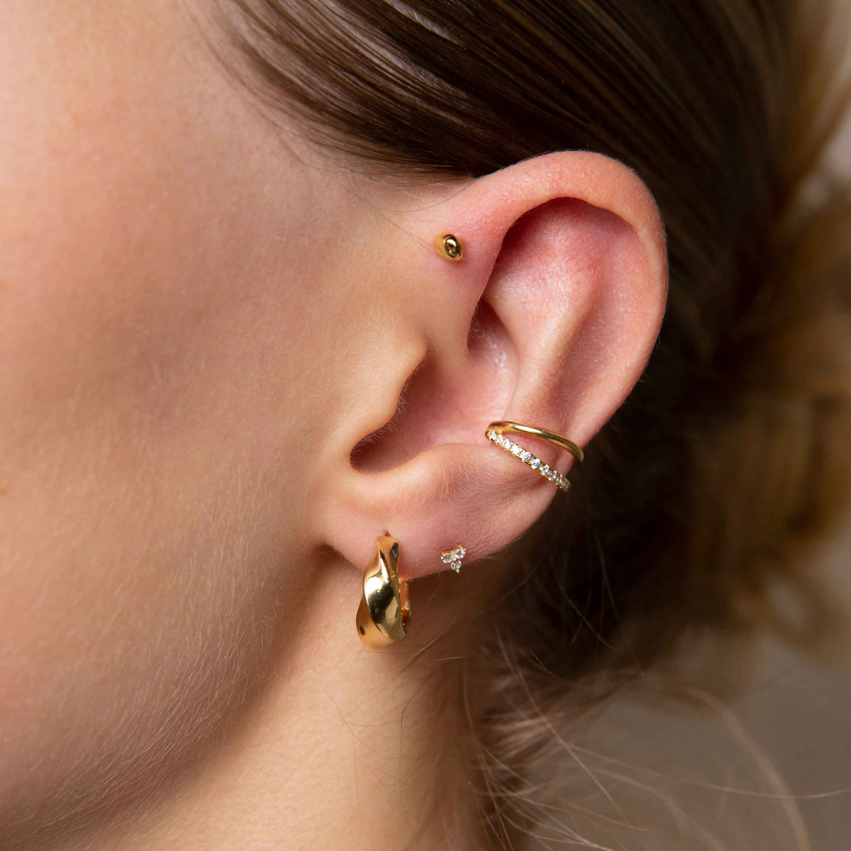 Kelly – Manchon d'oreille doré