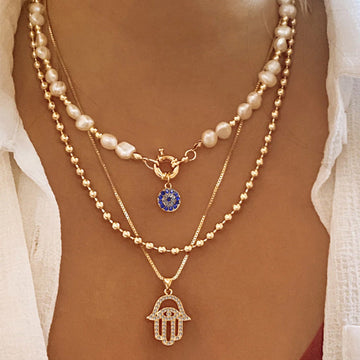 Jade – Collier en perles à plusieurs niveaux et Hamsa