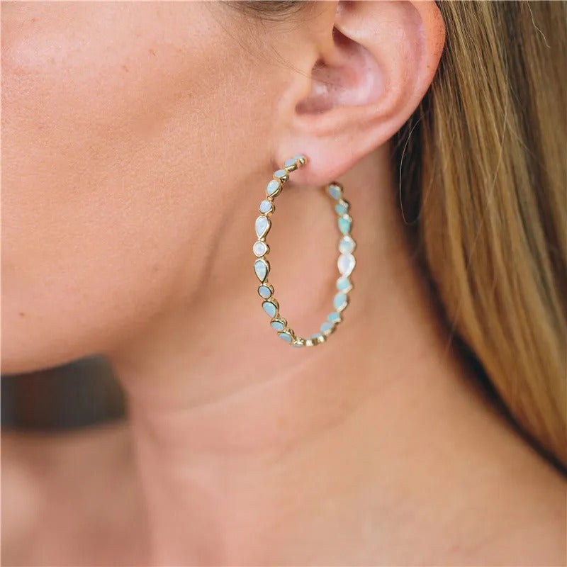 Raya – Boucles d'oreilles vintage dorées avec opale bleue
