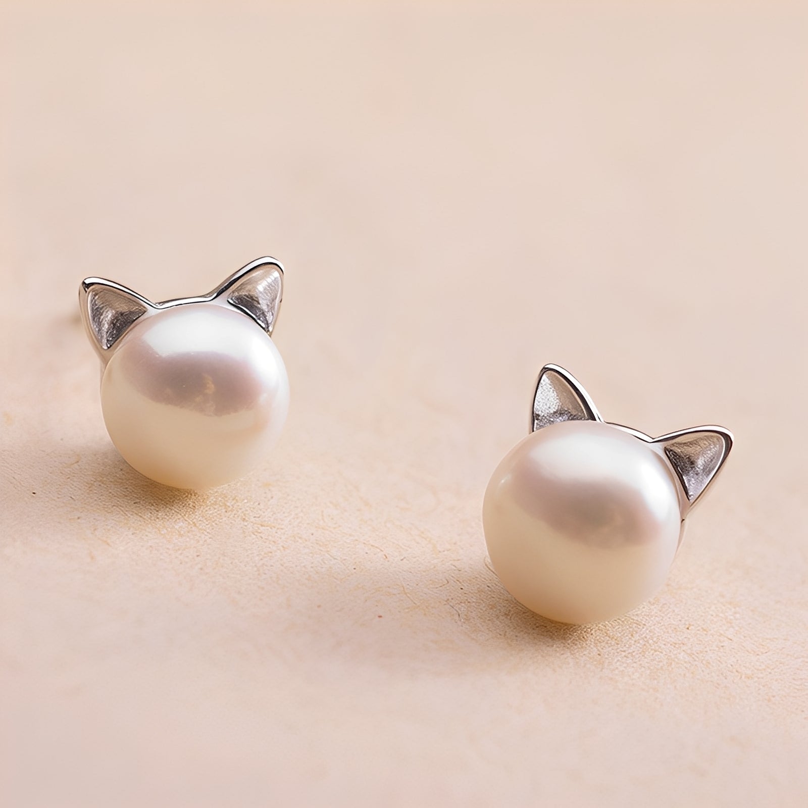 Nori – Boucles d'oreilles en chatons et perles d'argent