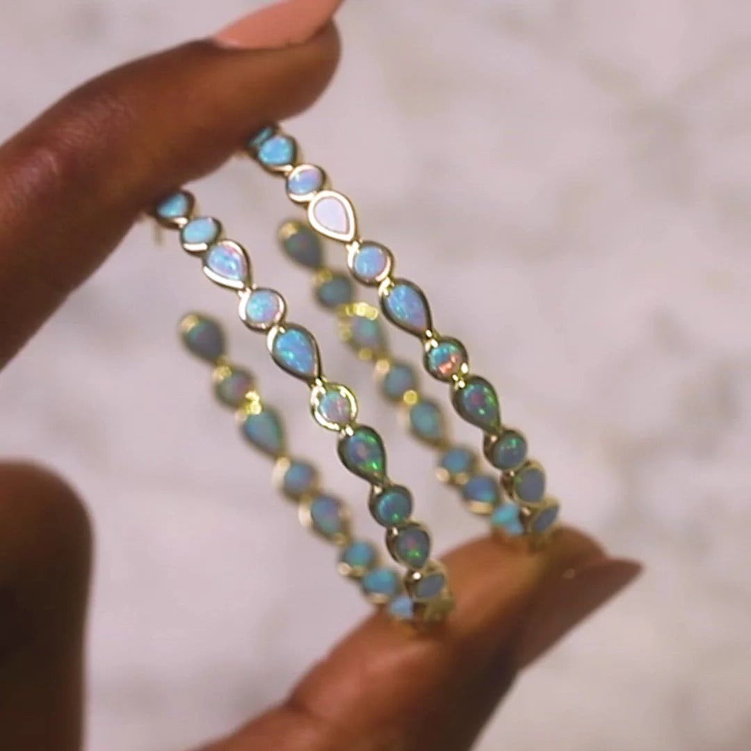 Raya – Boucles d'oreilles vintage dorées avec opale bleue