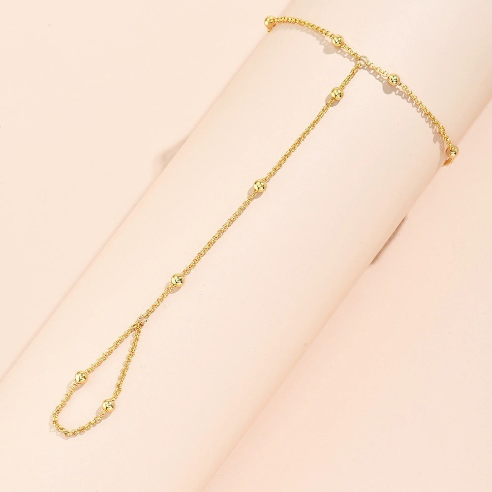 Lisa – Bracelet chaîne de perles et gants