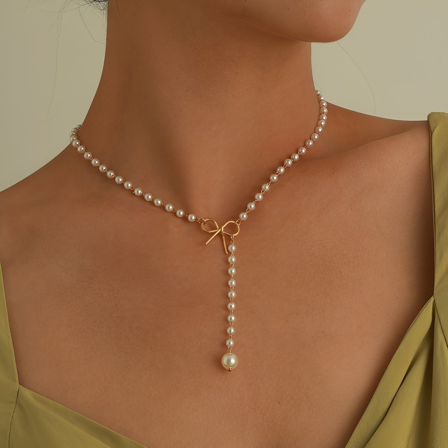 Antoneth – Collier avec pendentif nœud avec perle