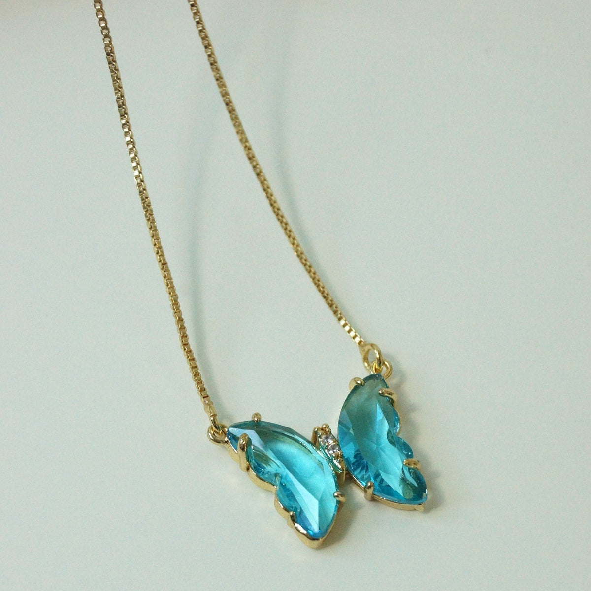 Aurora - Collier de papillon en cristal aqua